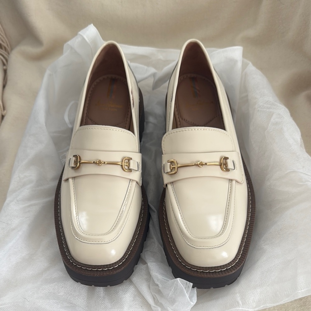 Cream patent leather loafers